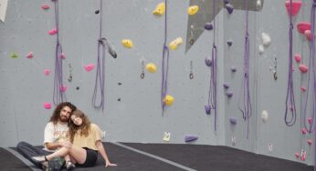 Reaching New Heights: The Magic of Indoor Rock Climbing Engagement Portraits